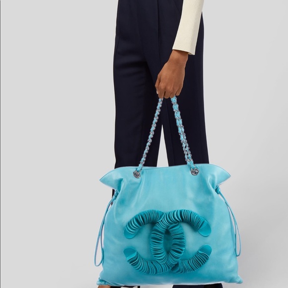 CHANEL Handbags - *.    ❤️PRICE DROP! ♥️RARE 💜 HP💜Chanel Authentic discus drawstring tote.